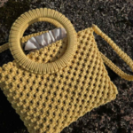 Geltona macrame rankinė